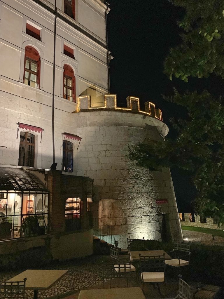 the side of the castle has a lovely garden with fountain and the great view and a small bar