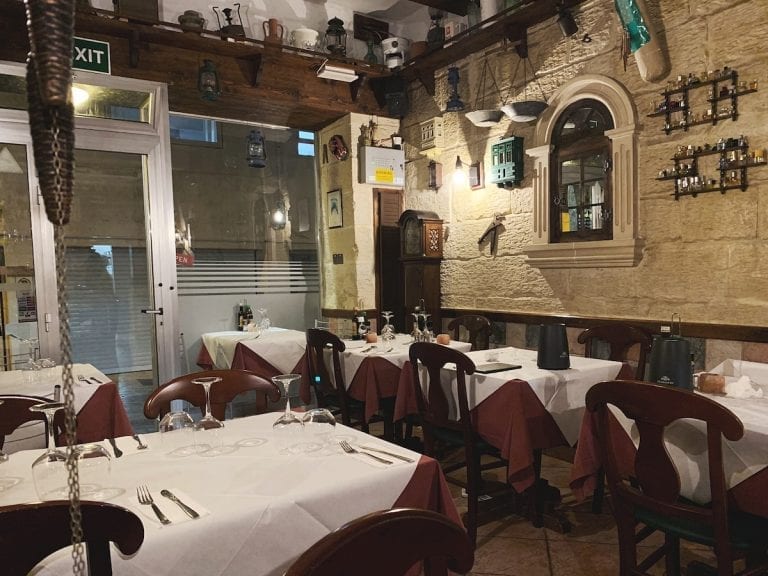 the cozy and interesting restaurant in malta with many different clocks on their walls