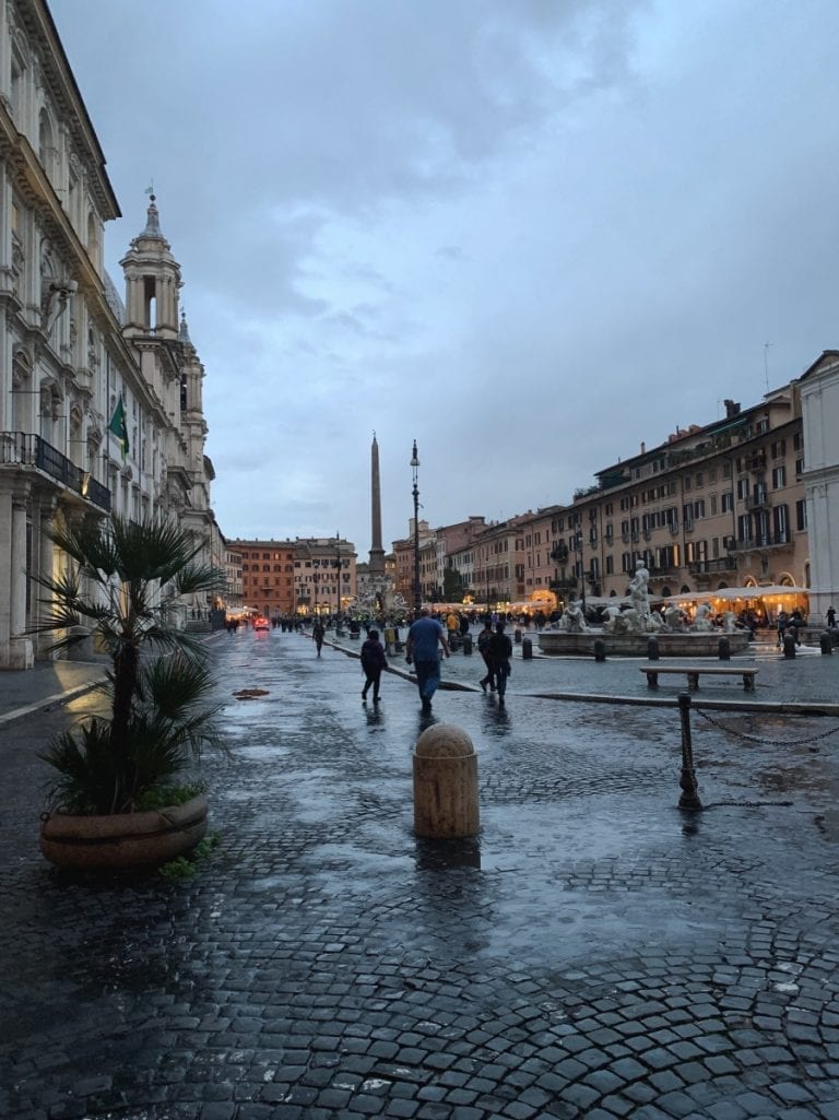the beautiful piazza navona in the early night in rome