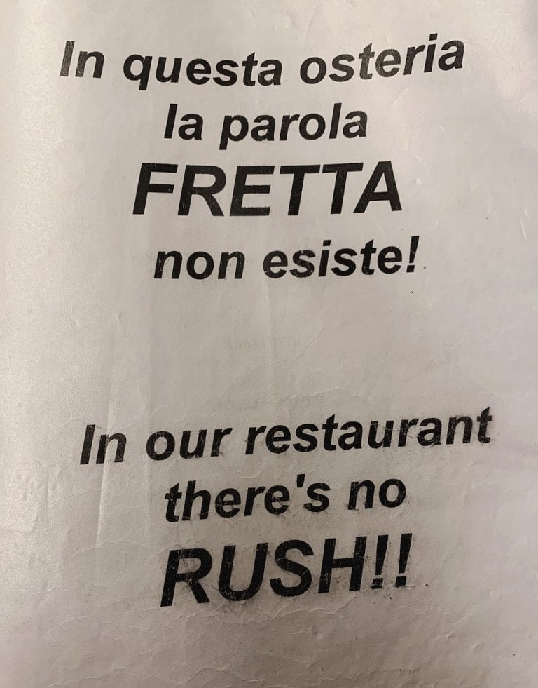 the funny statement from the restaurant shows the funny but true tradition of italians dining culture in a restaurant