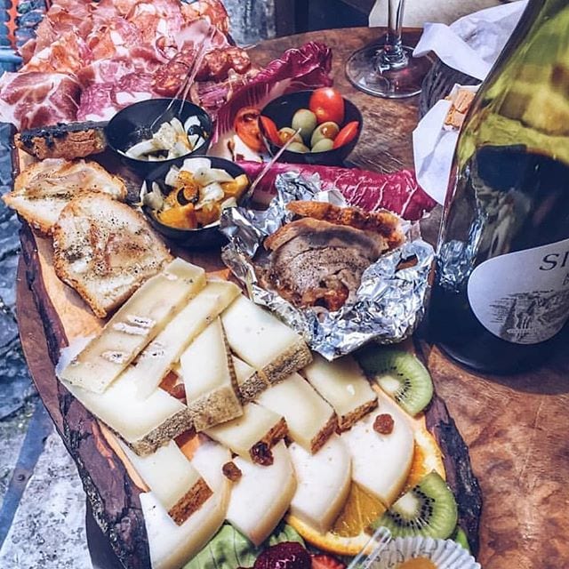 the beautiful platter with all italian's famous cold cuts and cheeses and it is great for a bottle of wine