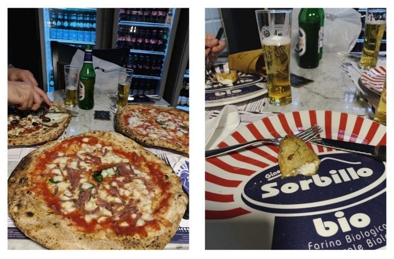 the pizza is bigger than the big plate in gino sorbillo pizza shop in rome