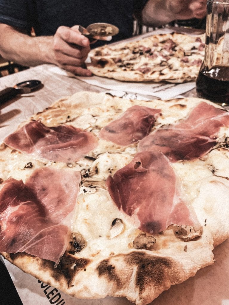 crispy romano style pizza served by the best pizza house la rotella in montefiascone