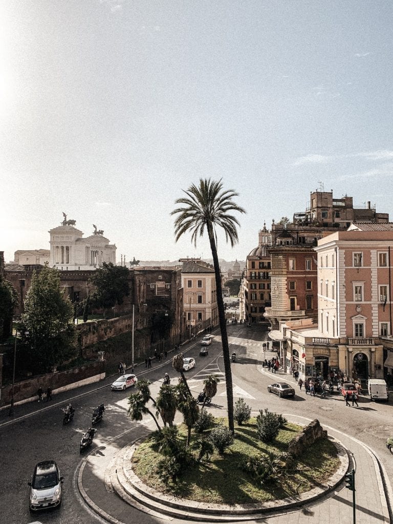 the view of rome busy streets and part of piazza venezia from villa aldobrandini garden in the air