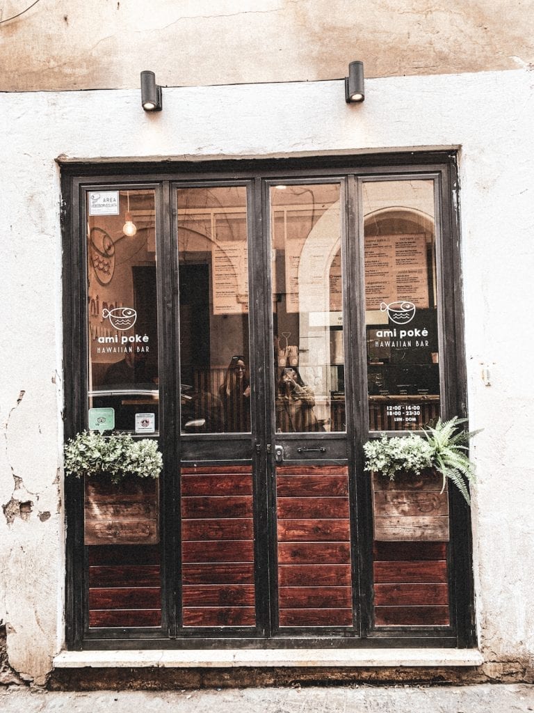 the tiny storefront of ami poke in cavour