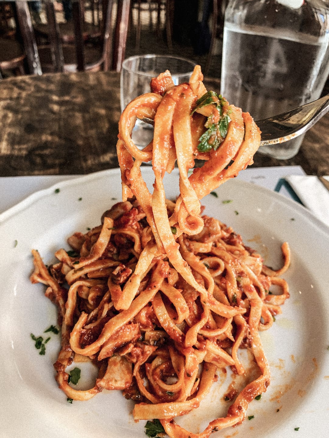 the yummy and simple tagliolini pasta with seafood and tomato sauce by civico 4 in cavour