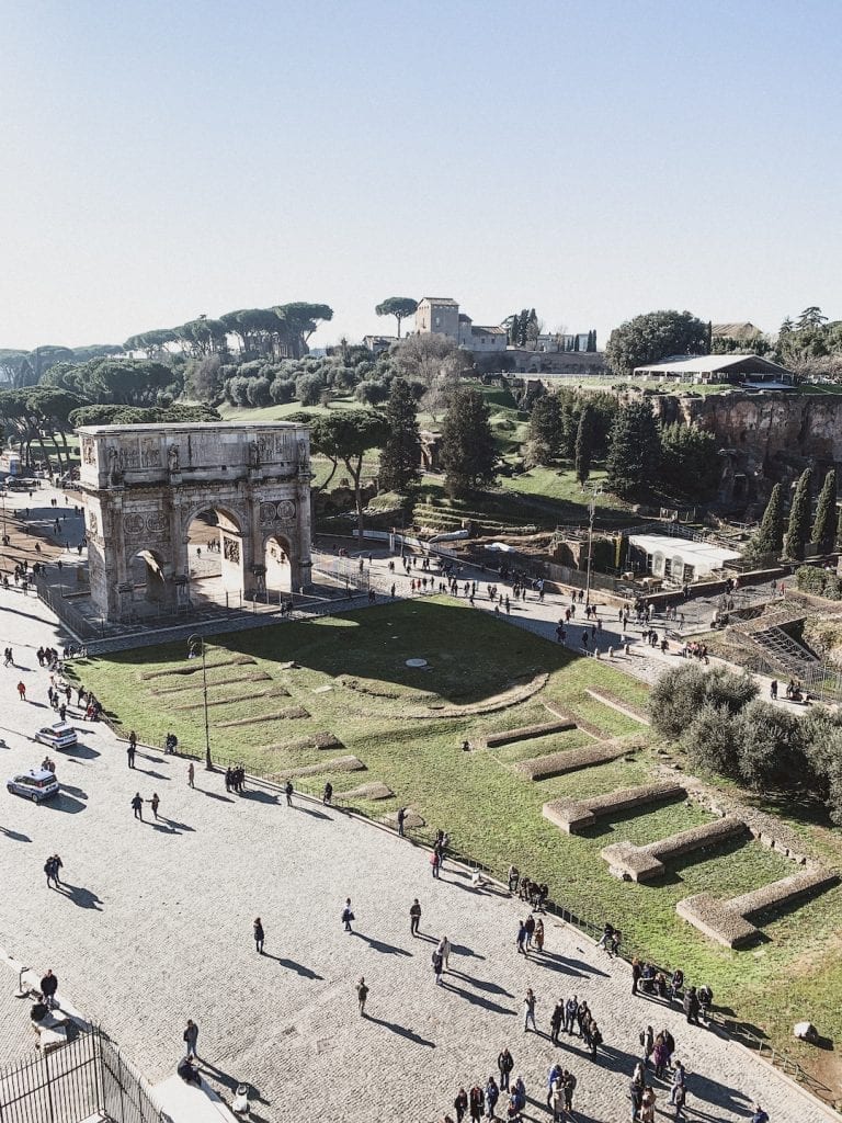 a great view of palatine hill and arc of constantine from the 3rd level of colosseum