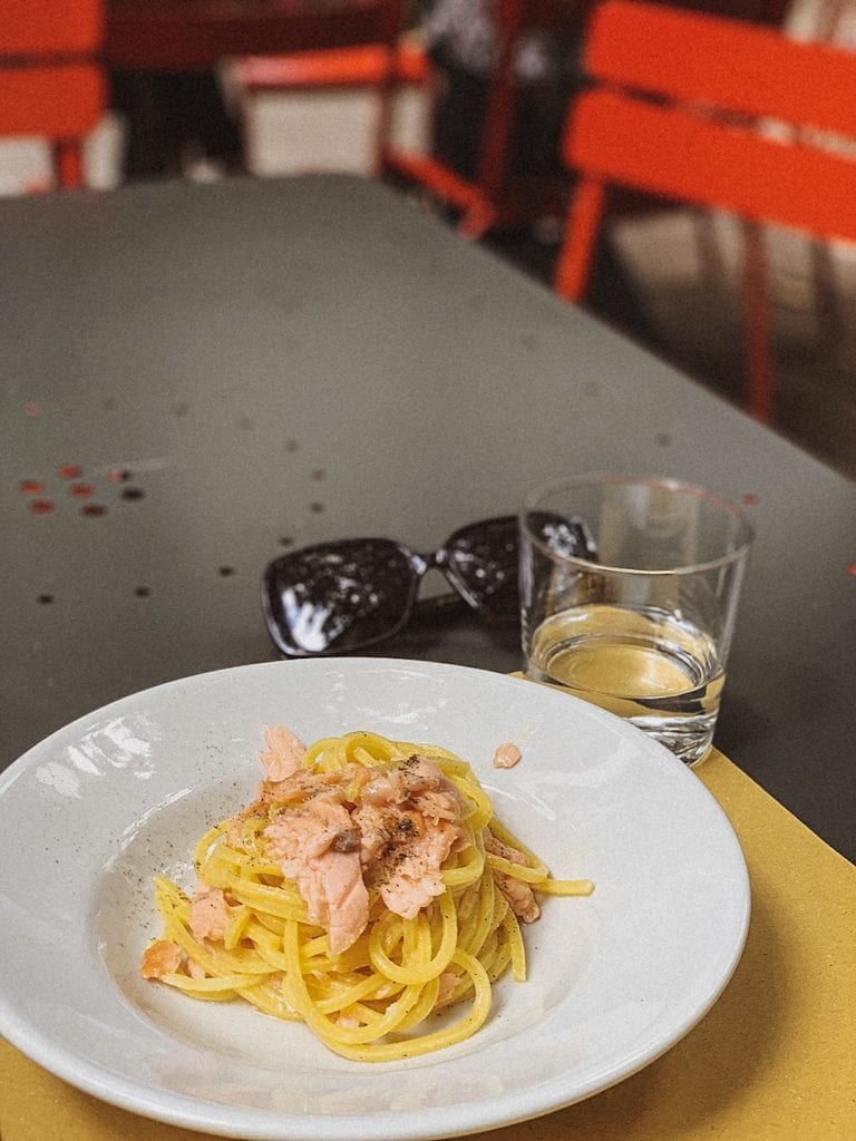 spaghetti pasta cooked with salmon and butter is a typical milan style or northern italian style pasta dish