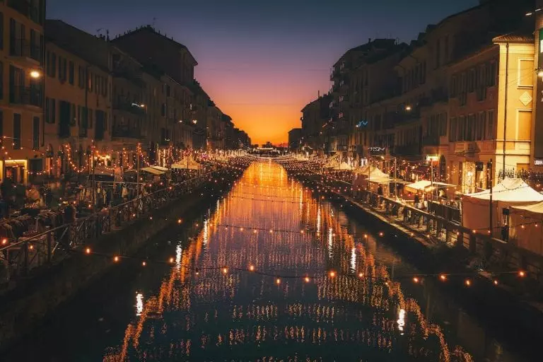 navigli in milan is the most famous place for italian's nightlife and it is also the place where the people go for the famous italian aperitivo