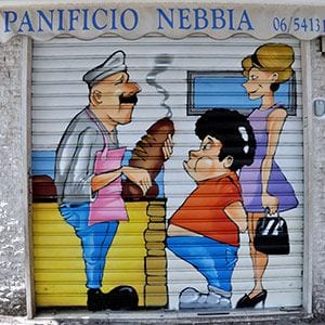 typical italian ironic scene in the graffiti on the shop roller shutter in Rome