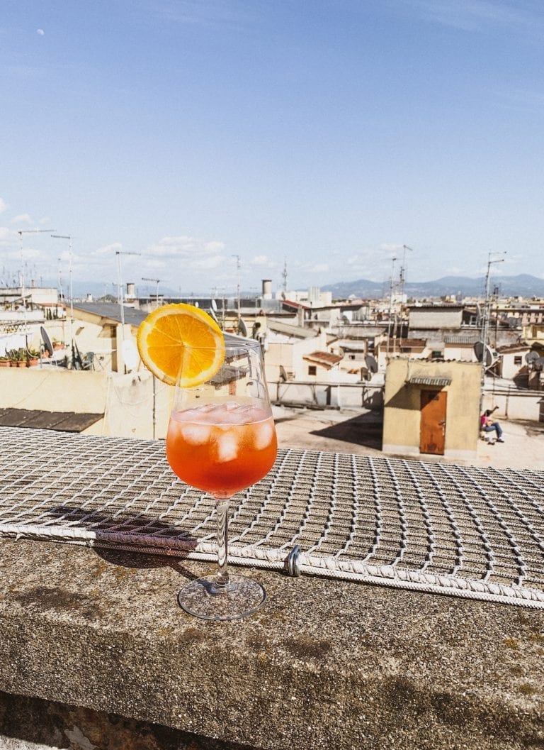 have a big glass of homemade aperol spritz on the rooftop when it is a lovely sunny weekend during lockdown