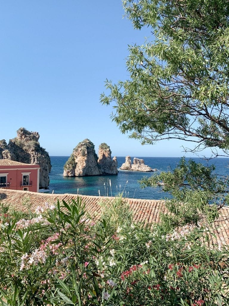 the big rocks are the natural barrier for the scopello bay