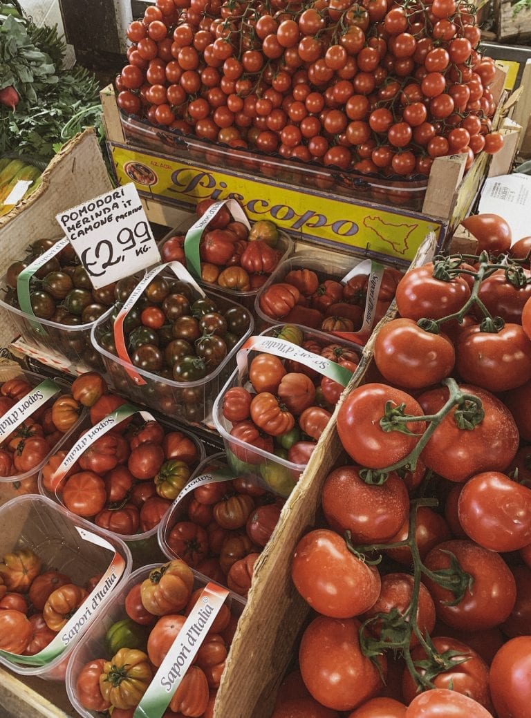 all different kinds of sweet and juicy tomatoes in a fresh market in Rome