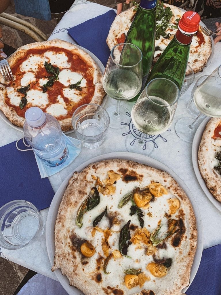 Dinner at Pizzeria da Ciro in Gaeta must be their famous Neapolitan pizza with all fresh southern Italian ingredients like yellow tomato, fish and zucchini flowers.