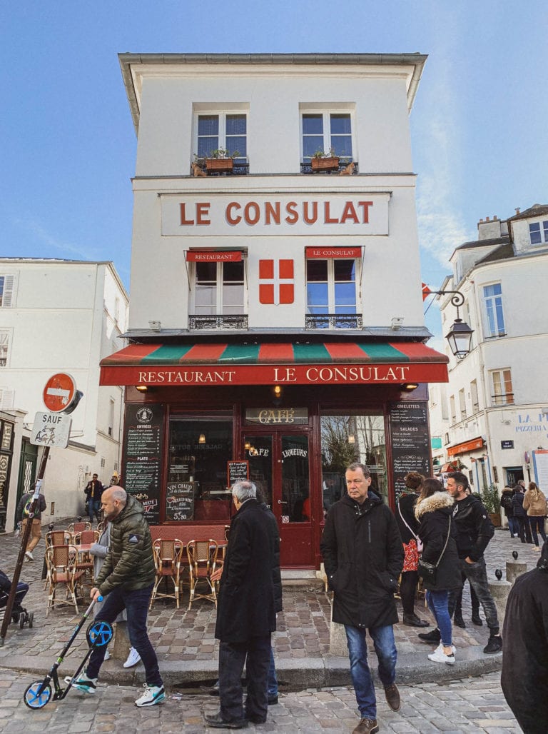 busy and vivid montmartre area in Paris for tourists and locals